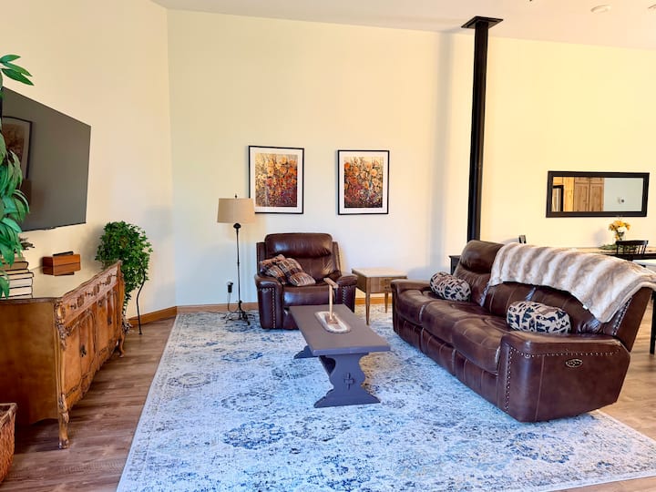 Upstairs Apartment living room-electric, reclining couch and chair, TV