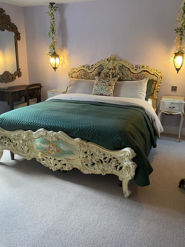 Beautiful large king size bed with dimmable lighting.  