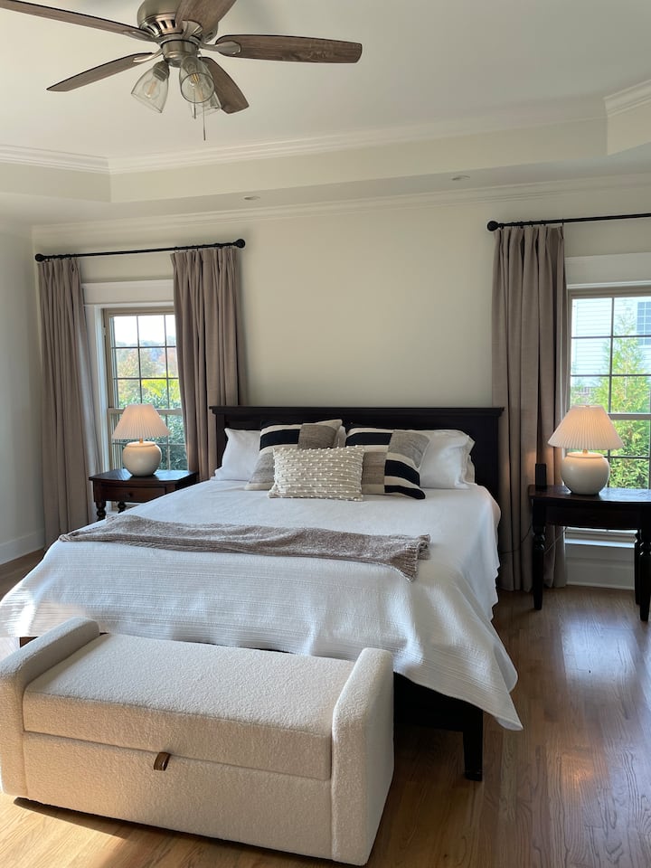 Master Bedroom suite with views of lake, king bed, double walk in closets and large master bath. 