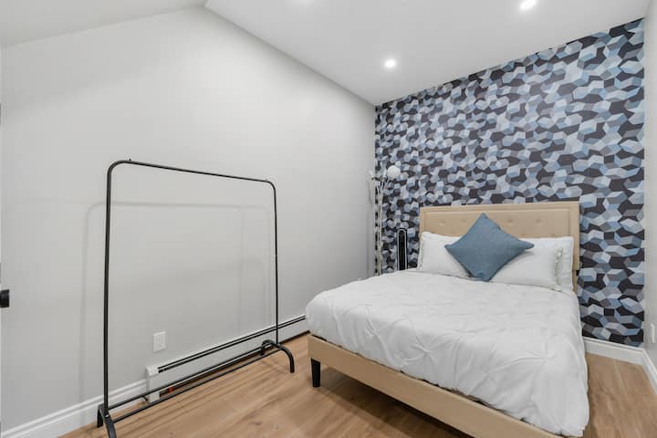 Welcome to the Ravenna bedroom at Casa Ladrillo, where history and elegance unite. Experience the charm of Ravenna with a plush bed, intricate decor, and a serene atmosphere. Let the ambiance transport you to Italy's mosaic city.