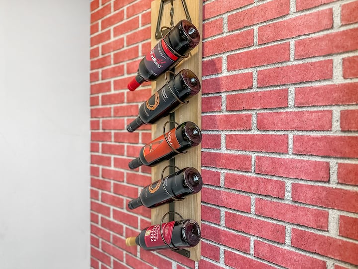 This is Milan at Casa Ladrillo, where sophistication and modern comfort converge with sleek furnishings, stylish decor, and a cozy ambiance. Savor a complimentary glass of fine Italian wine as you enjoy a taste of Italy in every detail