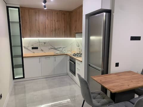 Wood. New modern apartment