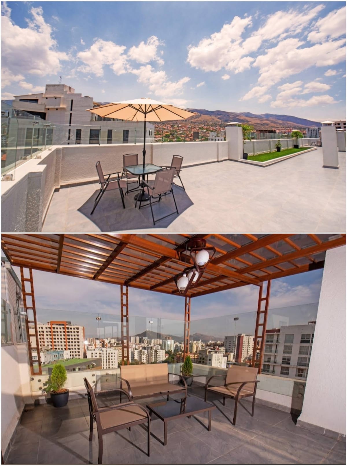 A spacious terrace area features a dining table with four chairs, complemented by a sun umbrella. The view includes surrounding hills and a clear blue sky. Adjacent seating under a wooden roof provides a comfortable lounge space with greenery nearby.
