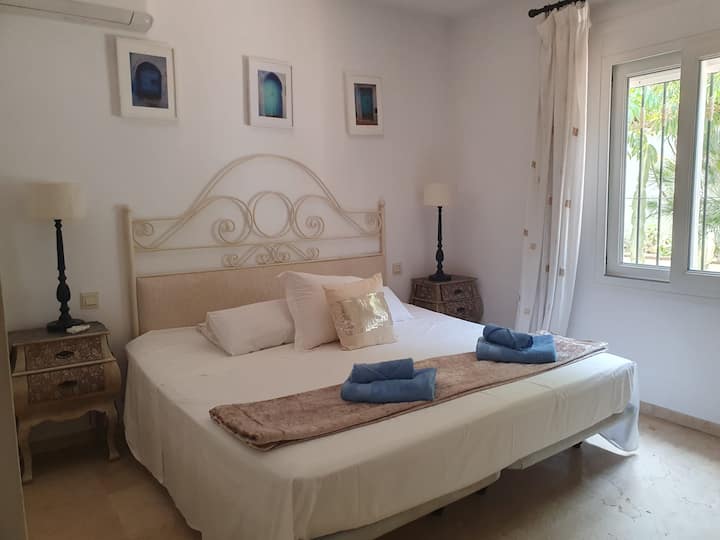 This en suite bedroom features an extra large bed.  An emperor bed is a little larger than a super king.  
