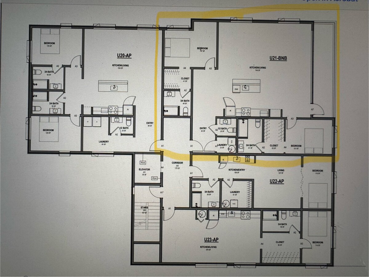 A floor plan of a two-bedroom apartment is depicted, showing a spacious layout that includes designated areas for living, dining, and kitchen. Each room's entry and adjoining features are clearly labeled, highlighting the organization of the space.