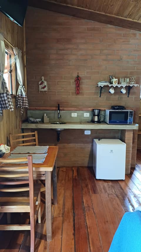 Popular Airbnb listing: Aconchego do Caboclo Cabin with Bathtub and Fireplace in Sapucaí Mirim