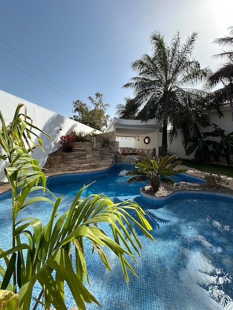 Beachside villa with hot tub 
In Residence