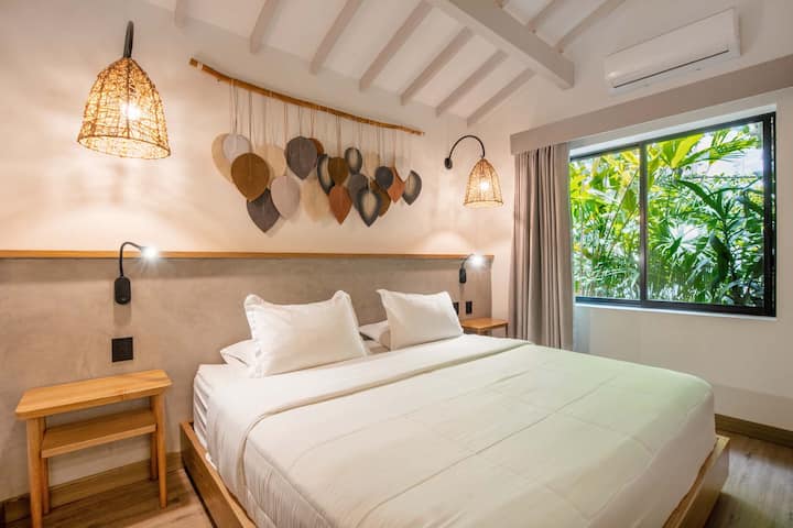 Rest and recharge in serene comfort: Stylish, tranquil bedrooms designed for a peaceful night's sleep and ultimate relaxation.