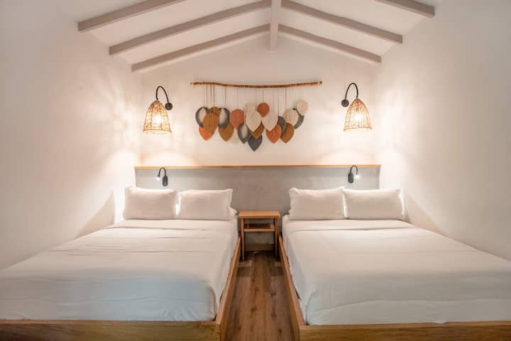 Rest and recharge in serene comfort: Stylish, tranquil bedrooms designed for a peaceful night's sleep and ultimate relaxation.