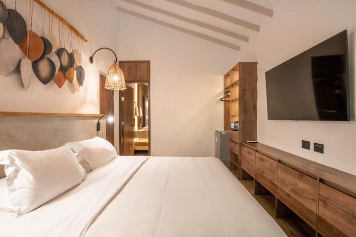 Rest and recharge in serene comfort: Stylish, tranquil bedrooms designed for a peaceful night's sleep and ultimate relaxation.