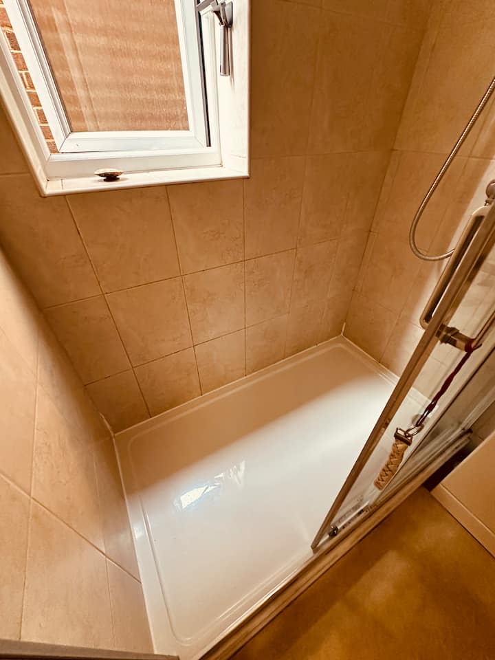 Condition of the shower. Includes hanger for hand towel.