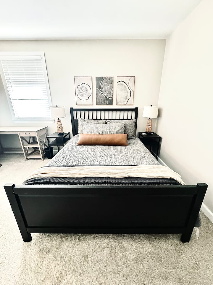 The first bedroom boasts a queen bed dressed in  premium Belgian flax linen bedding. 