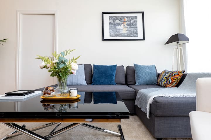 bright living room equipped with a comfortable and convertible sofa for relaxing moments but also for a restful sleep.