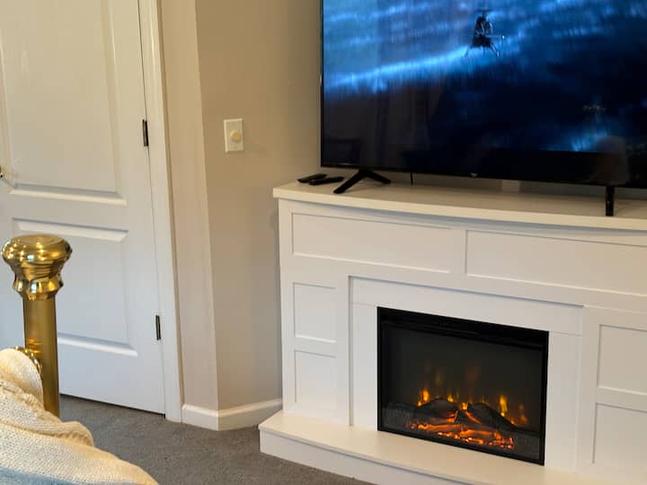 A warm cozy remote controlled fireplace. 