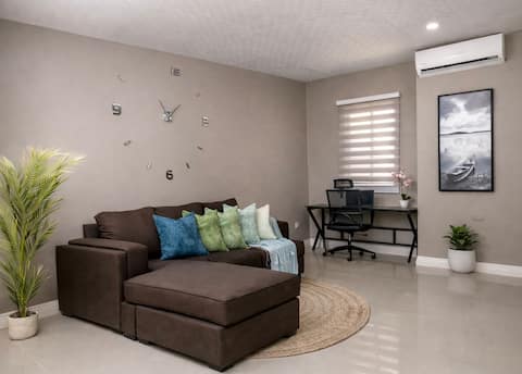 The Dwelling - Smart 2Bdr Condo near Int. Airport