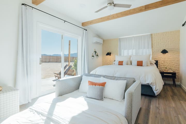 Primary Suite with Slider — Wake to Desert Light & Mountain Views.