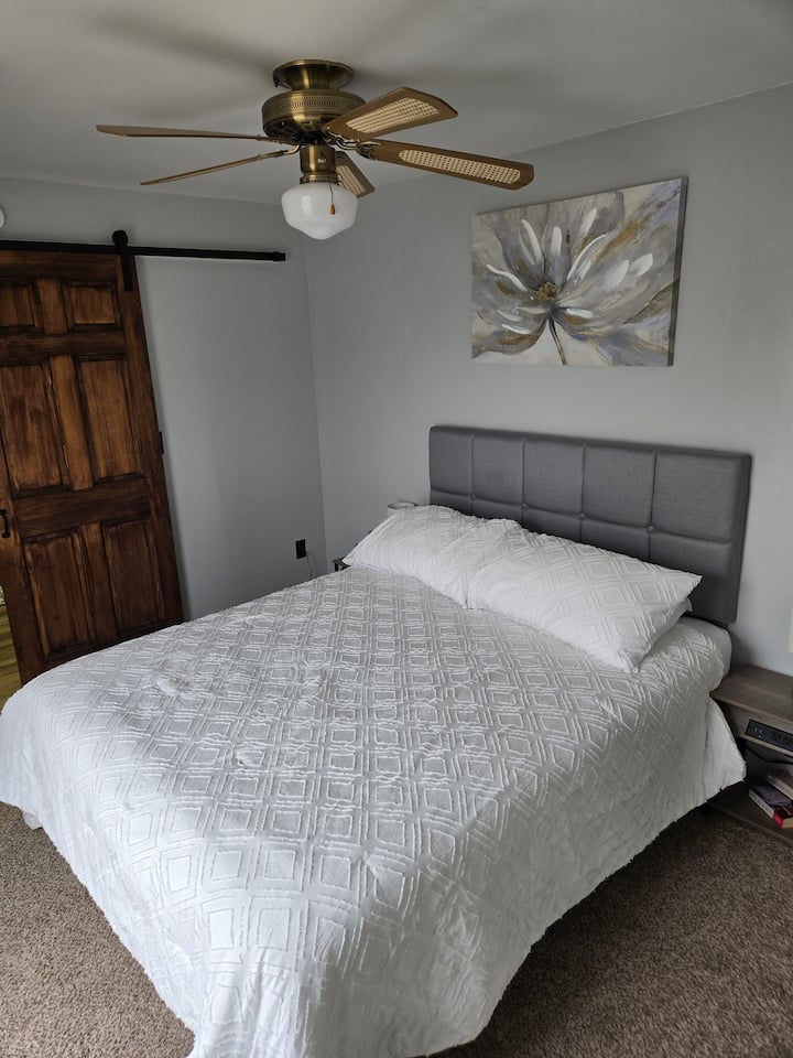 Queen size bed, upper floor.