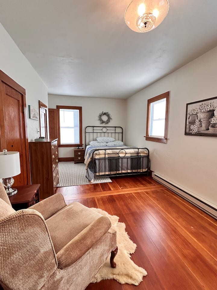 Primary bedroom is spacious enough for rest and relaxation.