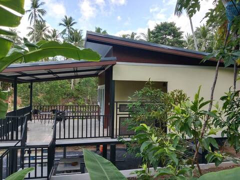Relax and Recharge in a Spacious Jungle House
