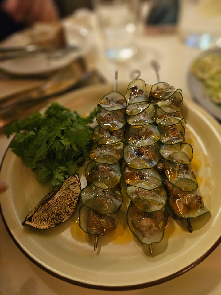 It's a dish with grilled lamb and cucumbers.
This restaurant has a lot of food that pairs well with wine.