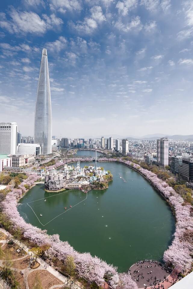 Lotte Tower and Seokchon Lake next to Lotte World. 
Take a walk along the lake and forget your complicated daily routine!