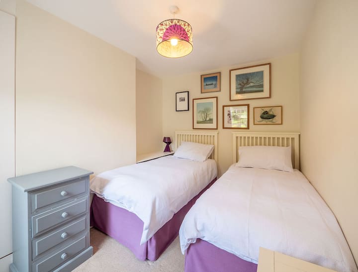 Twin bedded room, views to the rear