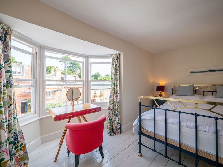 Master bedroom with views to the front of the property