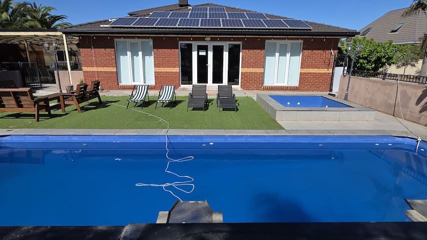 Luxury 5BR, 2.5BA Hillside Mansion with Pool