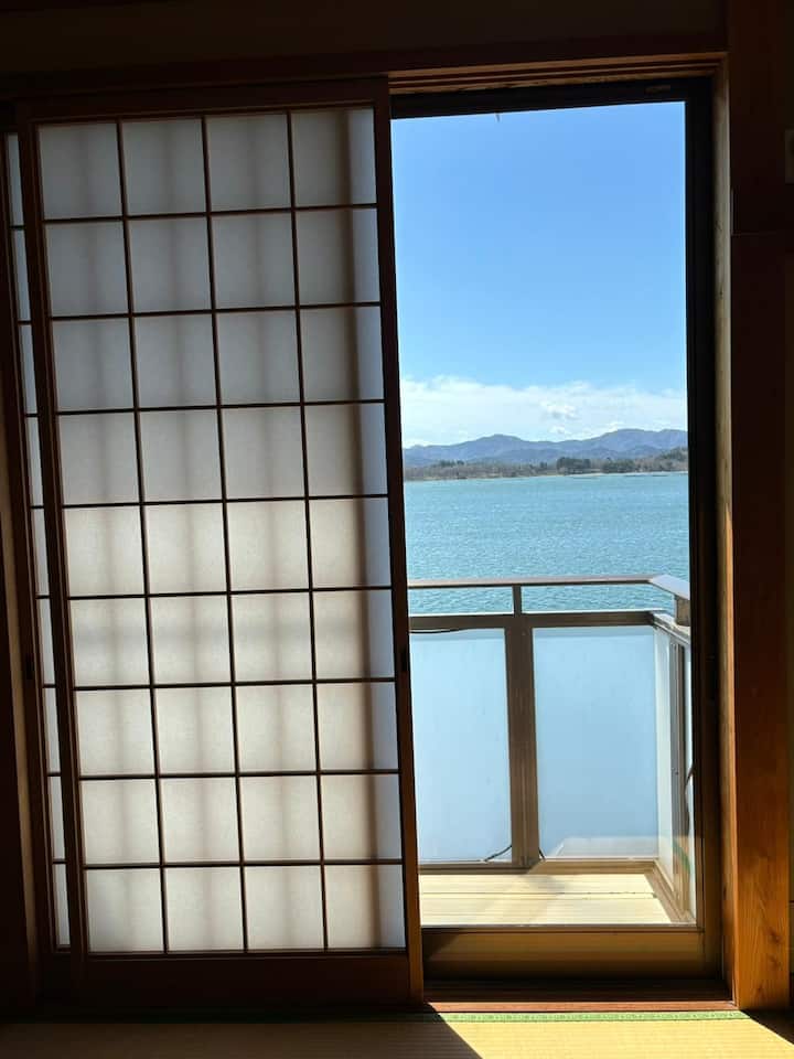 actual view overlooking Kumihama Bay from your private bedroom