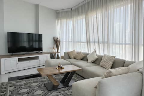 Popular Airbnb listing: Luxury Gulf-View | Al Qasba | Pool | Gym | Parking in Dubai