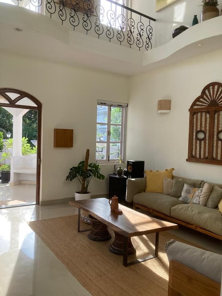 This lounge is opposite the blue one, on the ground floor, as you enter the house. The view is gorgeous.
