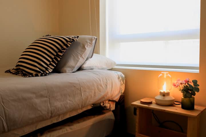 Secondary bedroom with a trundle bed for sleeping comfortably in two separate beds