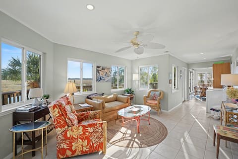Marsh views with dock, pool, & elevator!