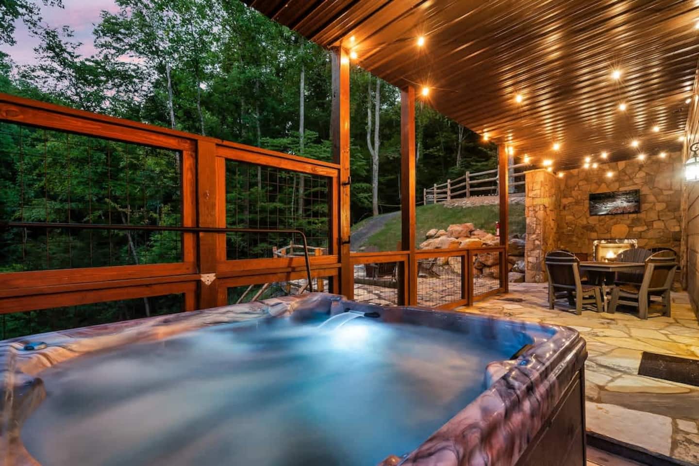 Creekside Adventure hot tub at twilight