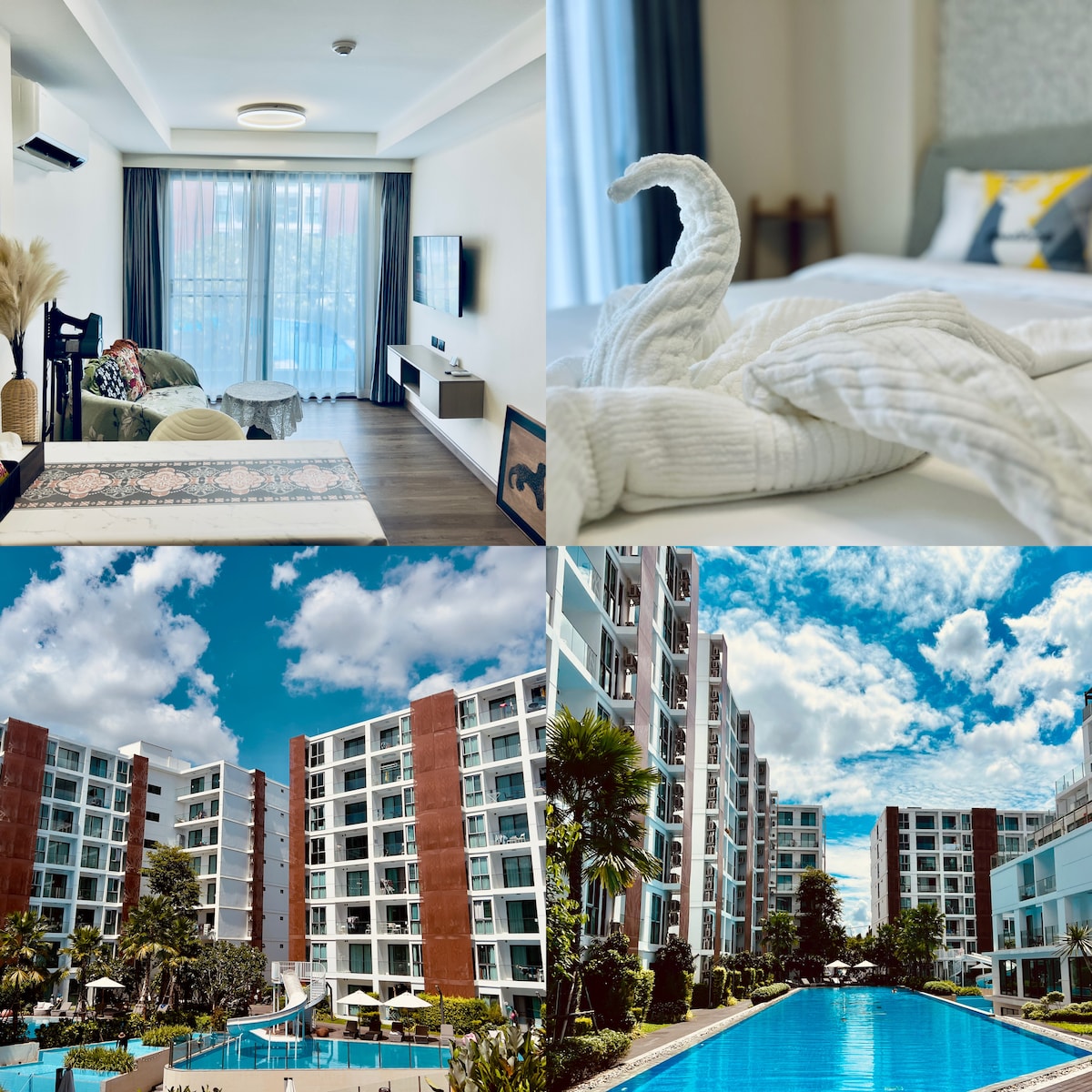 A modern living area displays comfortable seating, a flat-screen TV, and large windows allowing natural light. A neatly arranged bed features decorative towels folded in a swan shape. Outdoor views showcase a spacious pool, bordered by palm trees and lush landscaping, with the building visible in the background.