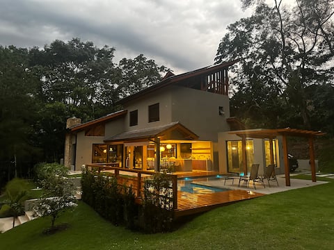 House with sauna and heated pool in a condominium