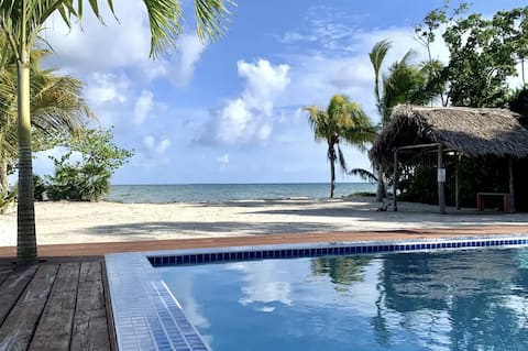Beachfront Paradise: Pool, Volleyball & Rooftop