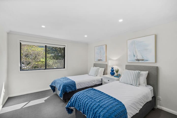 The third bedroom comes with two single beds, perfect for those travelling with kids.