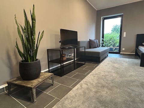 Erfolgreiche Airbnb-Immobilie: Cozy bungalow apartment - near Düsseldorf trade fair in Krefeld
