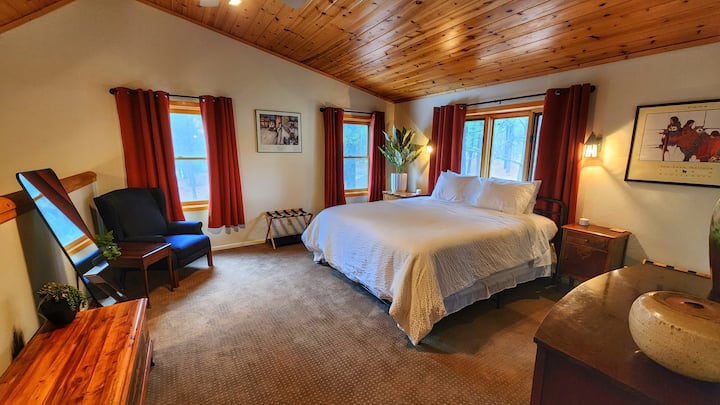 Bedroom 2 (Lofted Upstairs Master King Bed)
- Luggage Racks, Dresser
- Walk-In Closet w/ Shelves & Hangers
- Wedding Dress Hook
- Blackout Curtain
- Charging Stations (USB-A & C, Outlets)
- Ear-Plugs 
- Attached In-Suite Bathroom
- Full Length Mirror