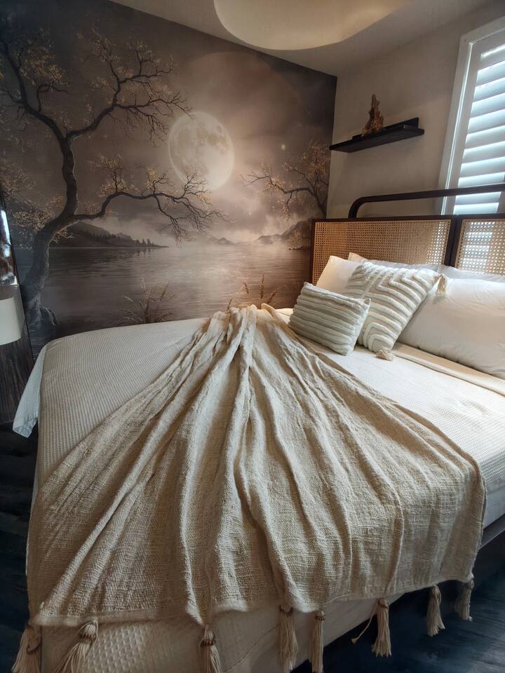 Soft textures, gentle light, and a bed made for real sleep.