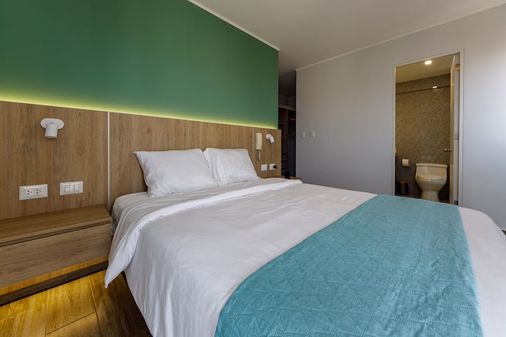 Queen size bed in the master bedroom with private bathroom 