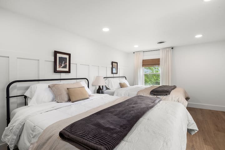 Bedroom 4 - light and airy with a comfortable layout and warm natural light.