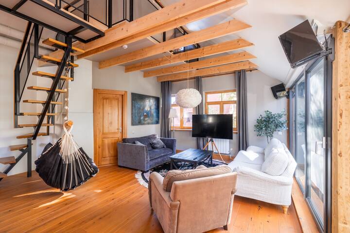 Cozy riverside penthouse