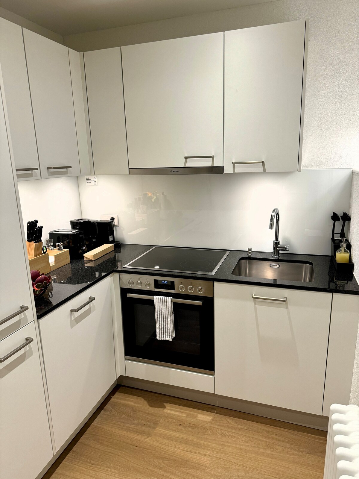 Top Airbnb: Modern boutique apartment with balcony in a top location in Sihlfeld