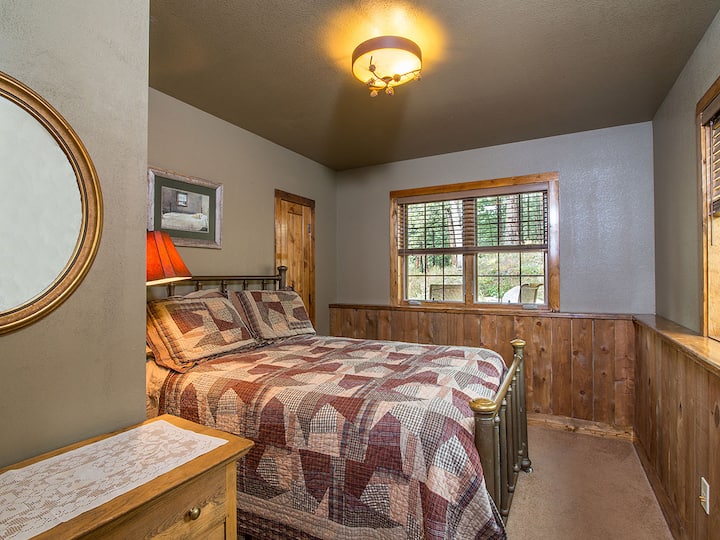 The Grandma Room has a queen bed and adjacent full bathroom with a walk-in shower.