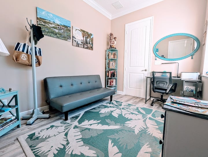 private office with foldable futon bed & door, can be used as a 4 th bedroom .