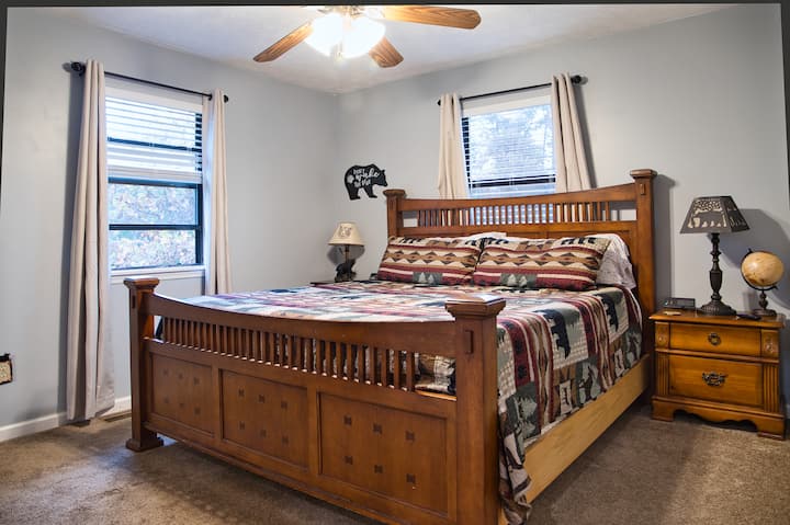The second bedroom has a king bed, new blackout curtains, a dresser, and a closet.