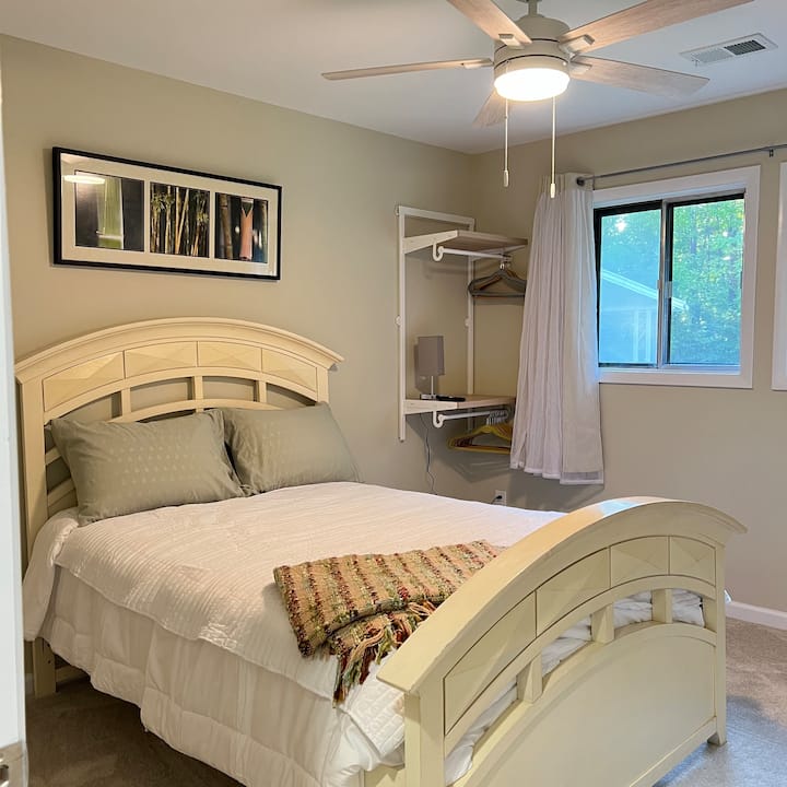 Double (Full size) bed featuring DreamCloud Premier Hybrid Plush Mattress.  There is a 32" TV, wall-closet space, mirror, and foldaway Single bed (stored under the bed, could be moved to any room).  The owner's closet (locked) is also in this room.