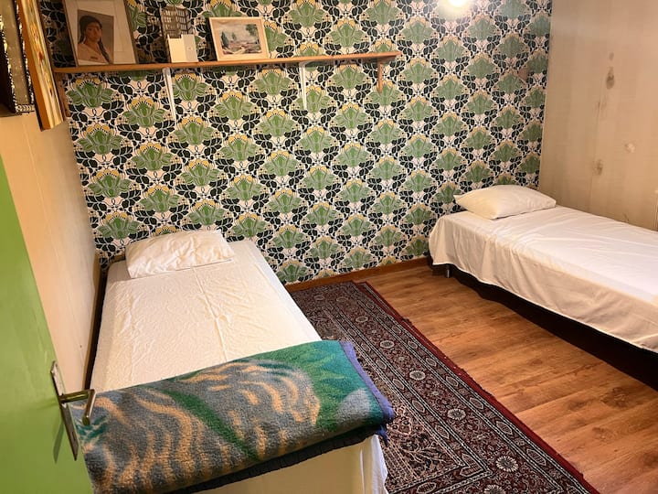 Due letti singoli che possono essere uniti in un letto matrimoniale.